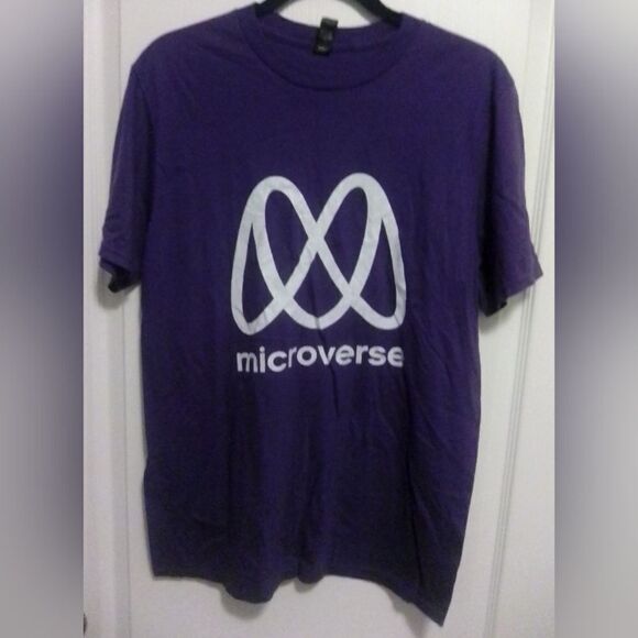 “Step into the world of Microverse with this eye-catching purple T-shirt featuri - Picture 3 of 4